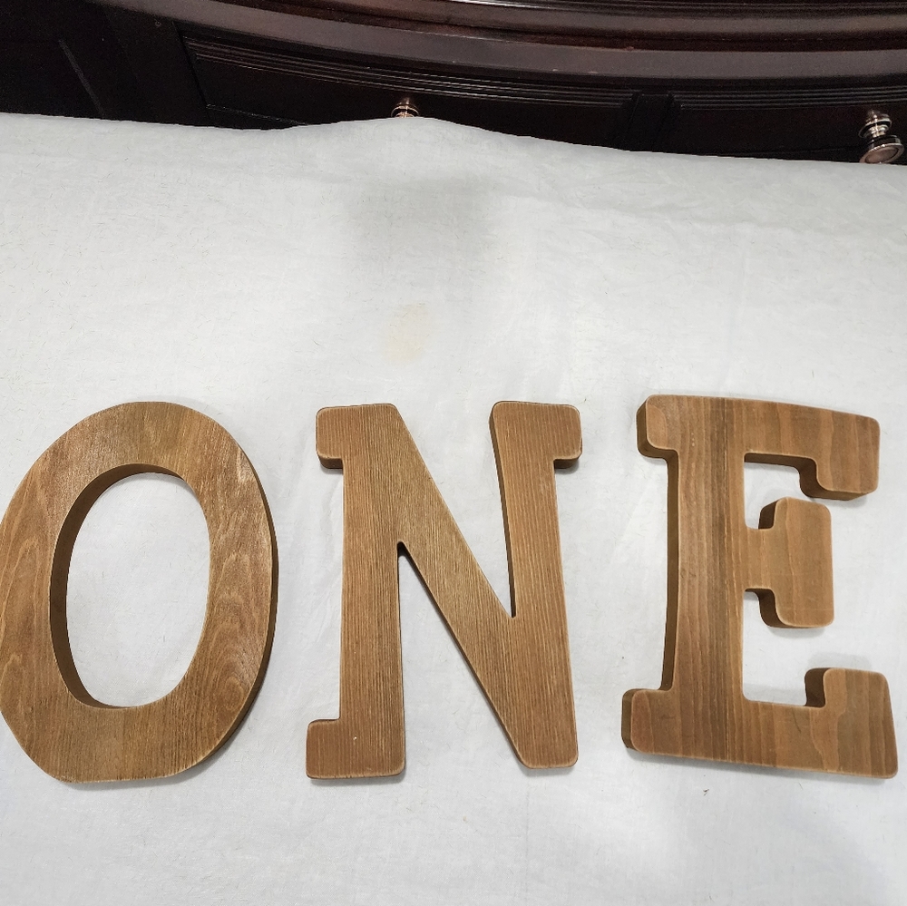 Wooden letters "ONE"